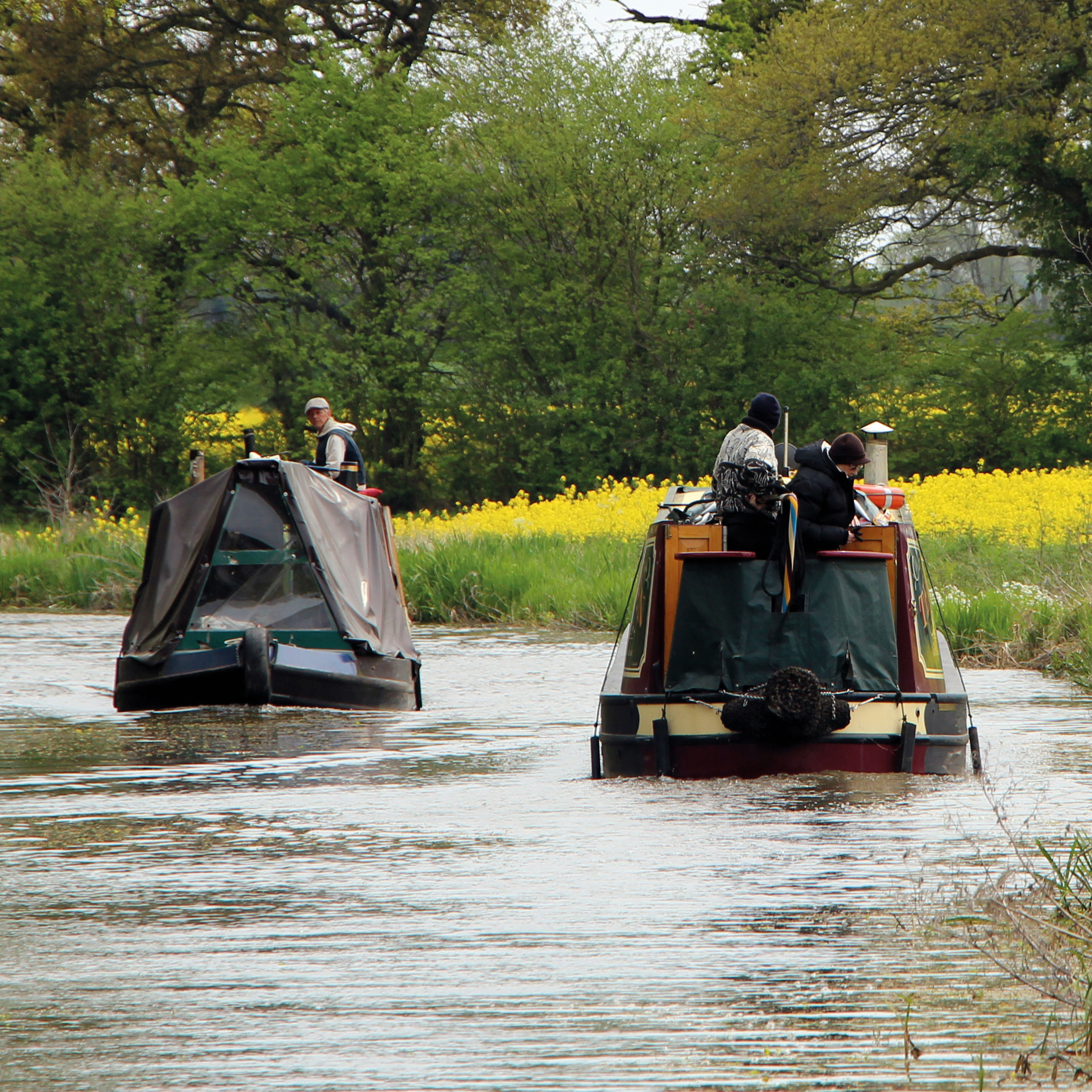 Boats cruising in Handsacre on the Trent & Mersey Canal