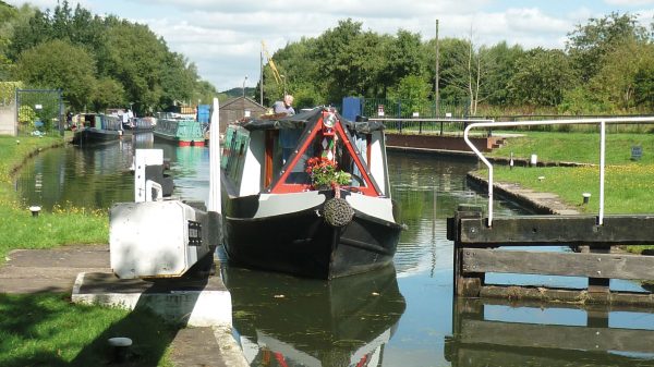 A boat leaving Langley Mill Basin on the Erewash Canal