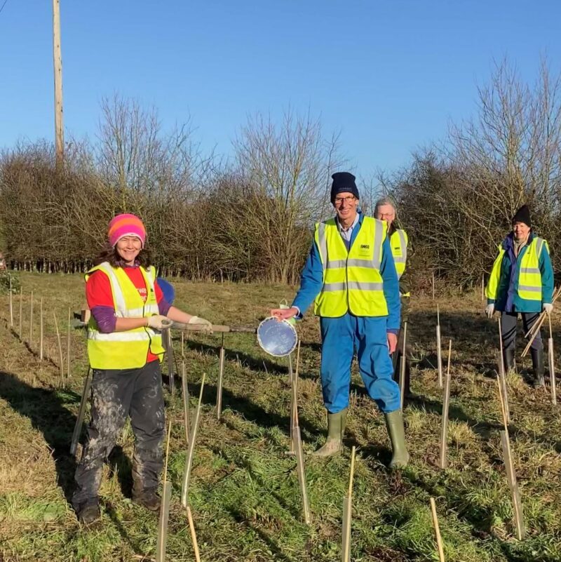 volunteer receiving award on work party