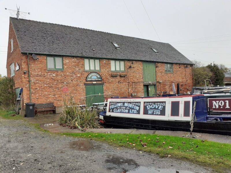 Shardlow warehouse B with narrowboat moored in front of it