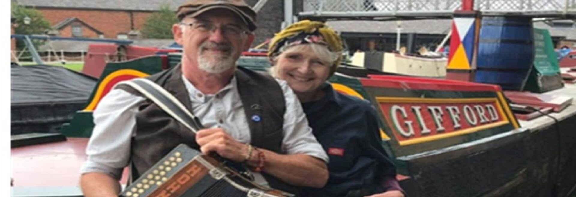 'Drywood' in front of canal boat Gifford