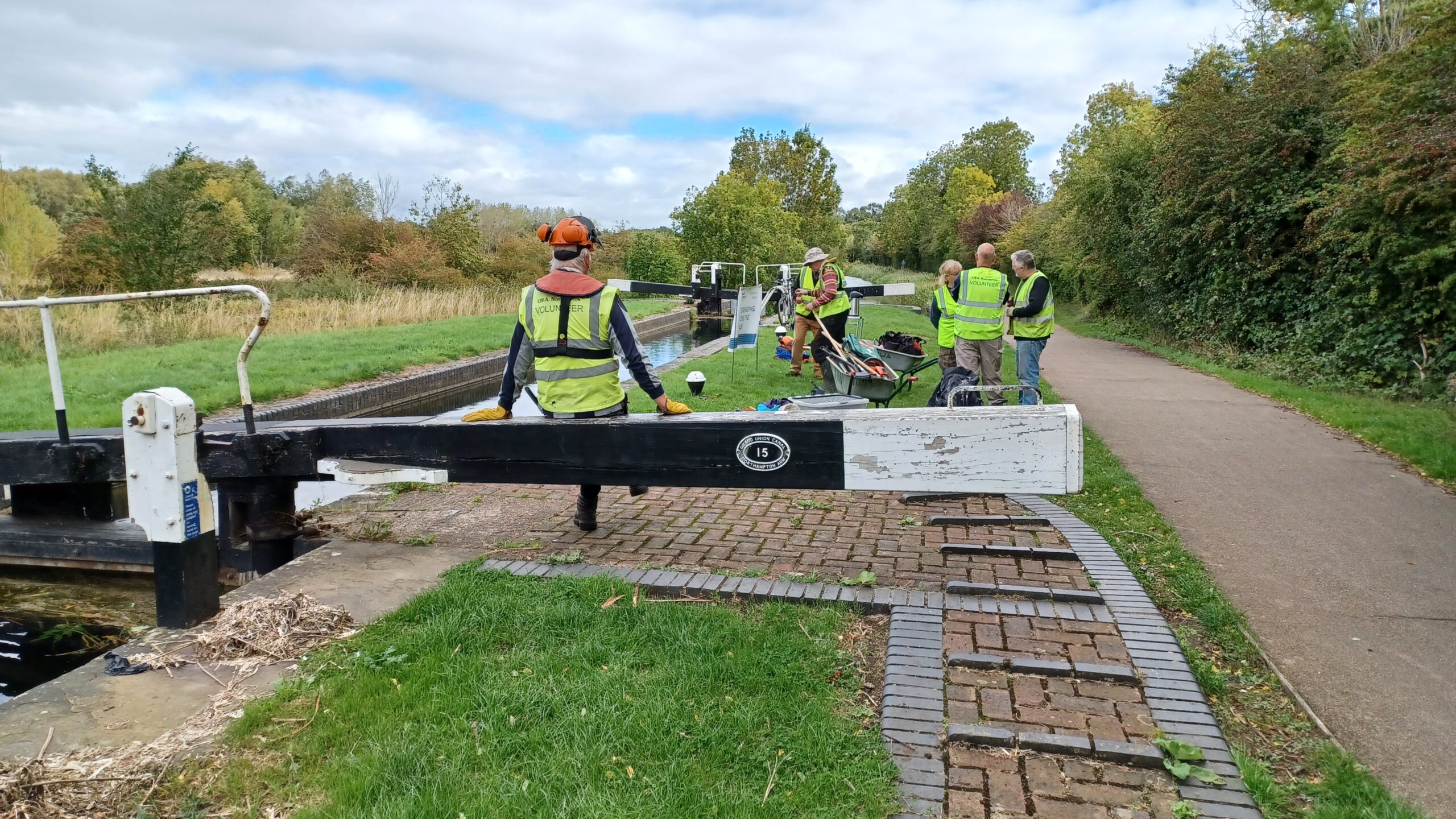 Group of Volunteers behind a lock beam