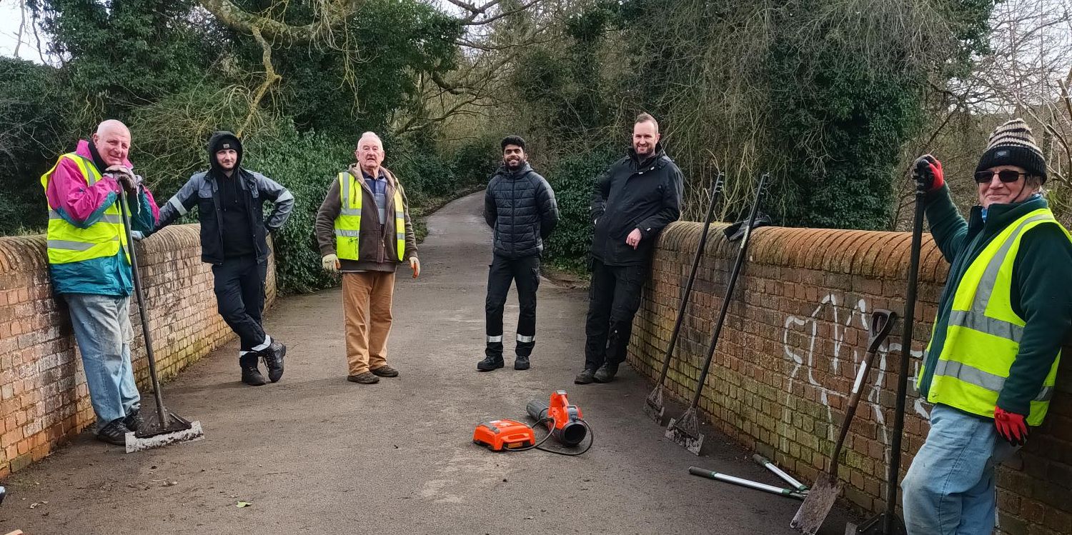 Task party volunteers gathered on bridge